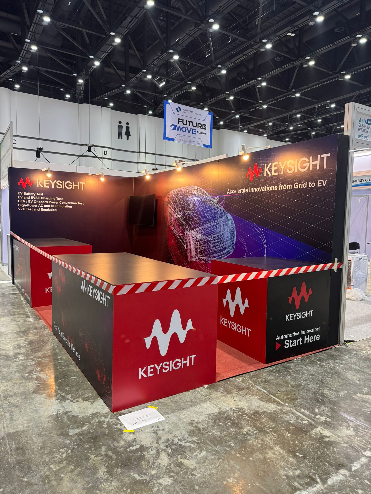 Keysight technology exhibition booth with branded meeting rooms